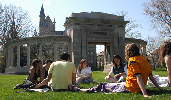Students sitting on campus together